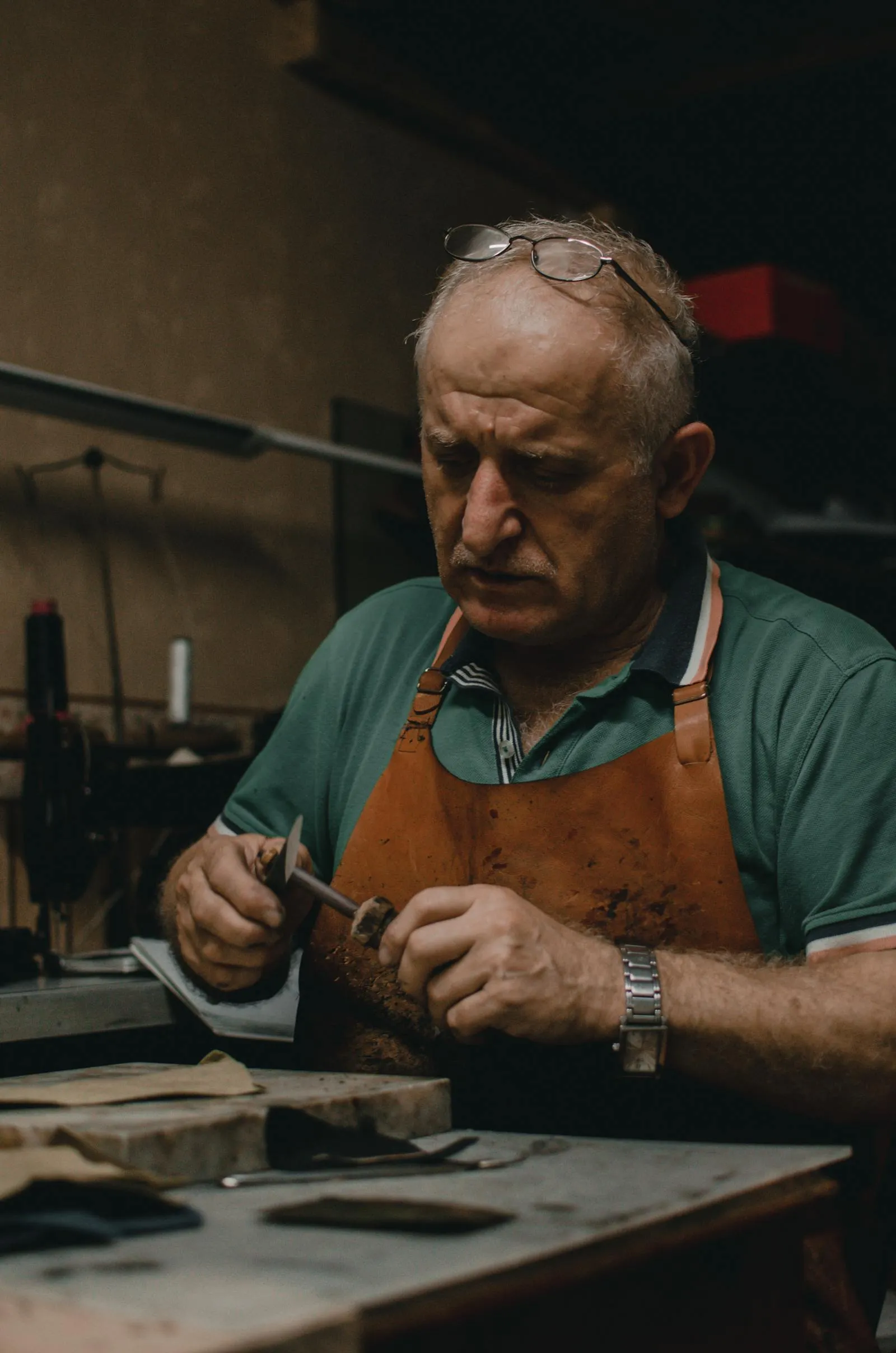 A craftsman's hands at work — the kind of careful detail The Custom Touch is known for.